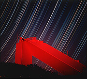 McMath Pierce Solar telescope at night with star trails