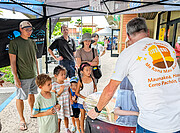 Family Visits NOIRLab Booth at AstroDay Kona 2024