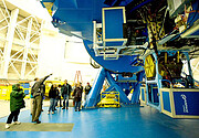 Staff family tour participants visit the telescope