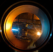 The view through a porthole of the Gemini South coating chamber