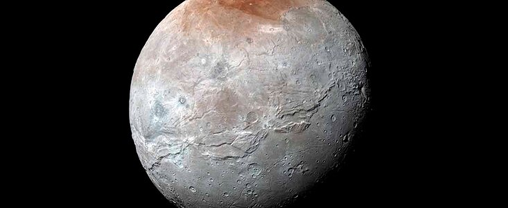 Pluto Spray Paints its Moon Red
