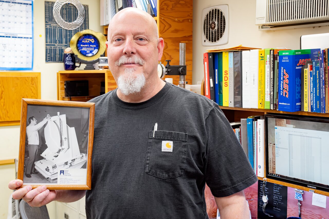 Ron Harris with a photo of his dad, Bob Harris