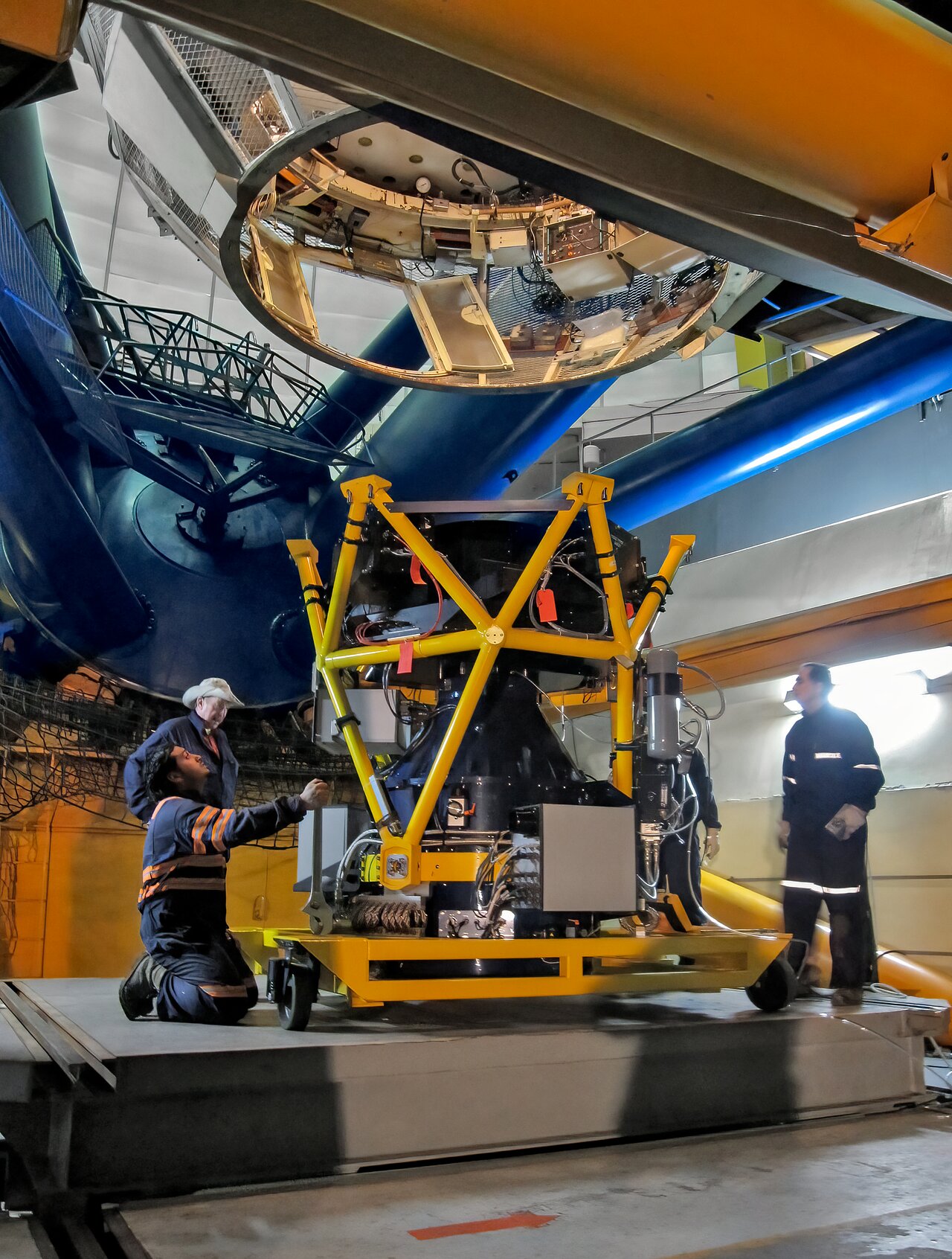 Raising the assembled NEWFIRM instrument for on-telescope installation and first light