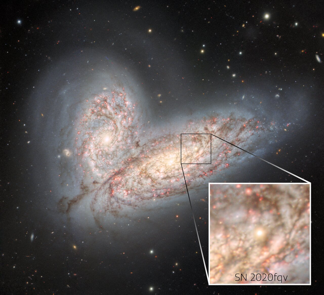 two spiral galaxies colliding