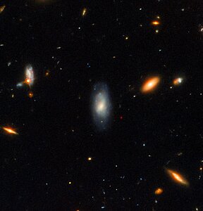 Imagen del resplandor posterior de una GRB tomada con Gemini Norte y Hubble (con anotaciones)