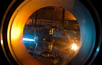 The view through a porthole of the Gemini South coating chamber