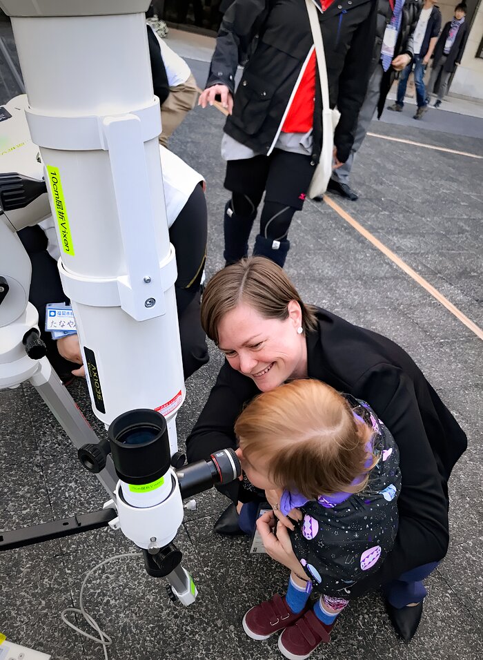 Amanda Bauer with a telescope