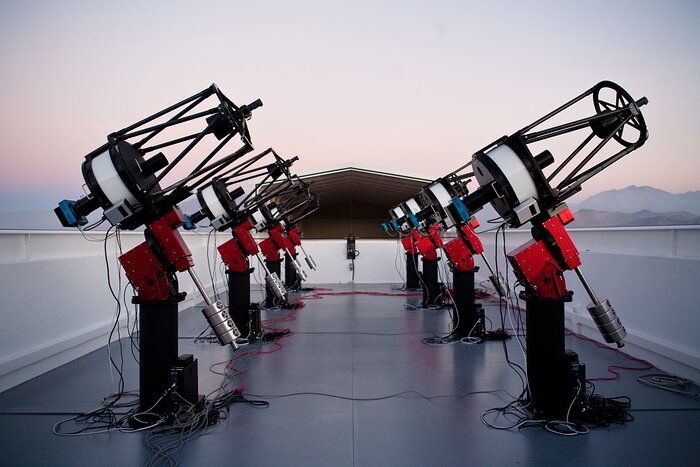 The MEarth-South telescope array, located on Cerro Tololo in Chile, searches for planets          by monitoring the brightness of nearby, small stars.