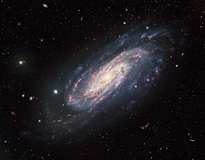 A Lonely Spiral in a Tapestry of Galaxies