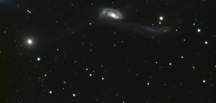 Interacting galaxy system Arp 102