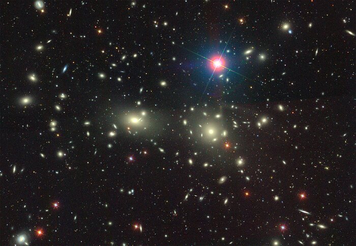 A Young Mammoth Cluster of Galaxies Sighted in the Early Universe