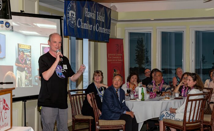 Andy Adamson speaks at the Journey through the Universe annual celebration