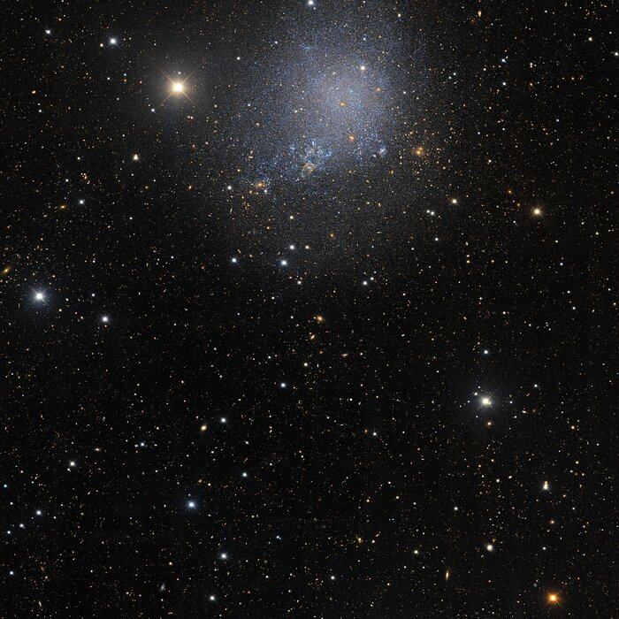 Wider view of irregular dwarf galaxy IC 1613 from the Dark Energy Survey
