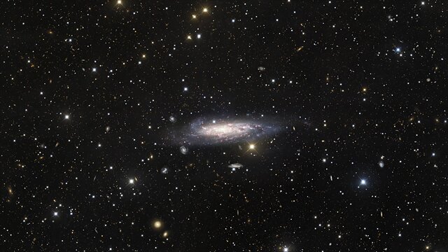 Zooming on NGC 1003