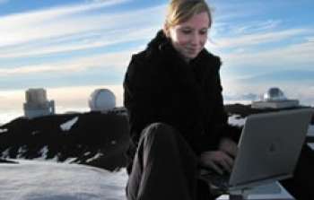 Image Caption: Mariska Kriek works outside on Mauna Kea 