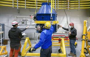 Mounting the NEWFIRM dewar onto its Lab Cart on the Blanco M floor.