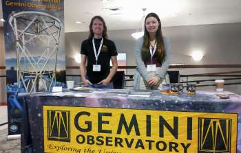David Jones and Emily Deibert at the International Gemini Observatory booth at the 2023 CASCA meeting.