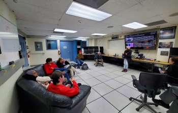 Garima Singh, an Adaptive Optics Scientist at Gemini North explaining Altair (Gemini North’s adaptive optics system) and exoplanet imaging to students from the University of Calgary at the Maunakea summit facility.